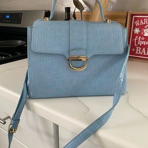 This beautiful blue cross bag, style it the way you want!!